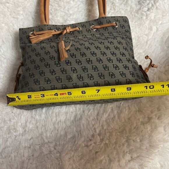 Dooney & Bourke small gray canvas logo tan leather straps and tassels.satchel. - Picture 11 of 12